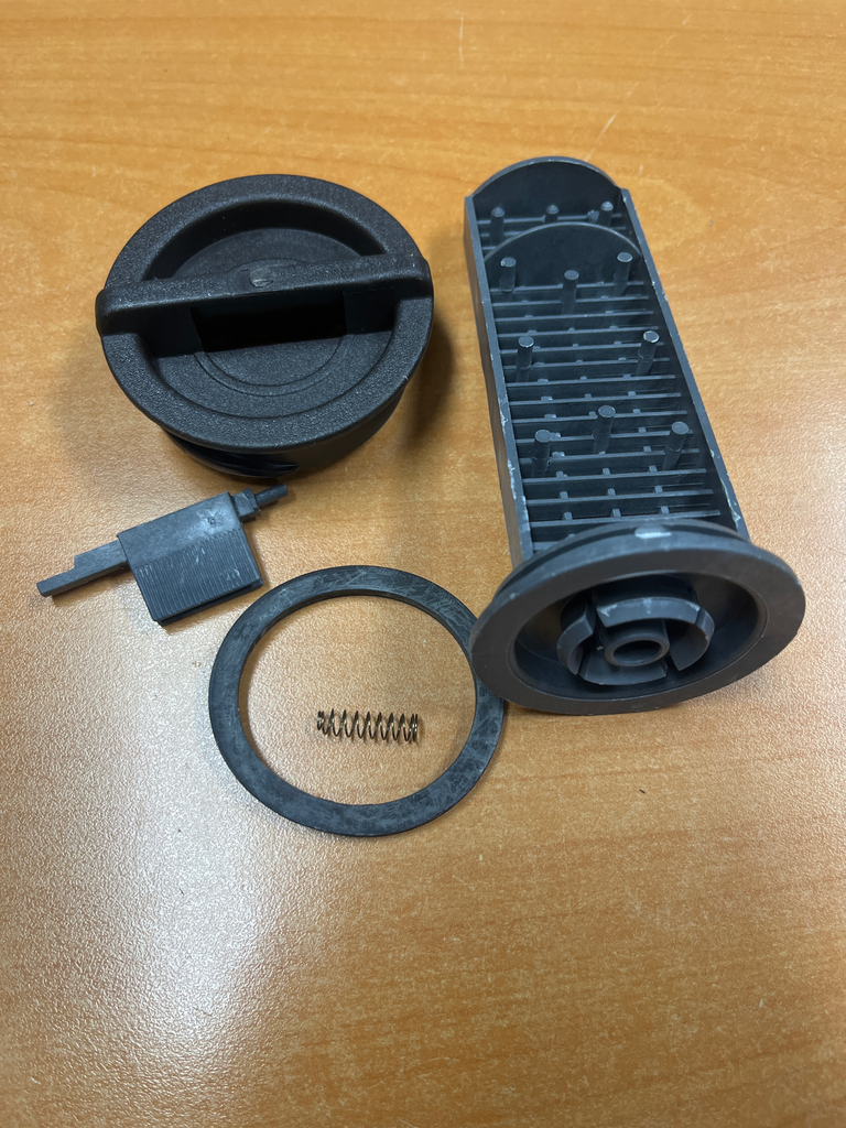 BOUCHON / FILTRE DE POMPE DE VIDANGE M.L. CANDY - Jusqu'à fin de stock